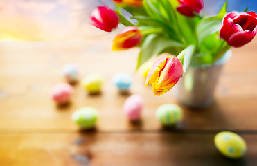 Image showing close up of tulip flowers and easter eggs