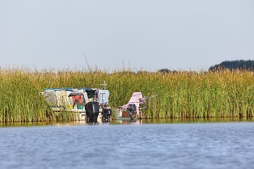 Image showing Fishing boats on a lake