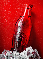 Image showing Cola on a red background