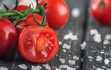 Image showing Sliced cherry tomato and salt