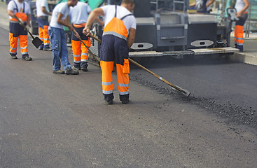 Image showing Construction workers on asphalting and road repair