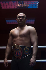 Image showing kick boxer with his championship belt