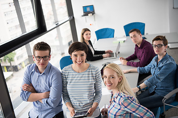 Image showing group of Business People Working With Tablet in startup office