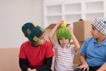 Image showing boys with cardboard boxes around them