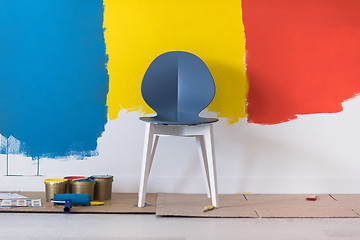 Image showing empty chair and equipment for painting