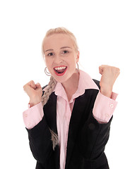 Image showing Smiling business woman with her fists