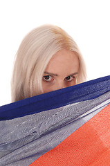 Image showing Woman hiding behind soma fabric