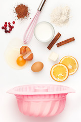 Image showing The falling ingredients of pie or cake on white background