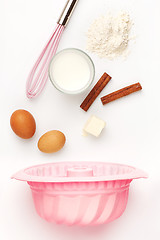 Image showing The falling ingredients of pie or cake on white background
