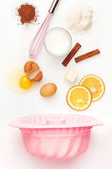 Image showing The falling ingredients of pie or cake on white background