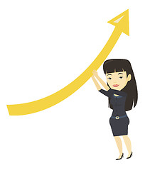 Image showing Business woman holding arrow going up.