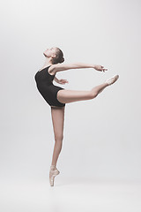 Image showing Young classical dancer isolated on white background.