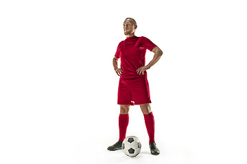 Image showing Professional football soccer player with ball isolated white background