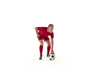 Image showing Professional football soccer player with ball isolated white background