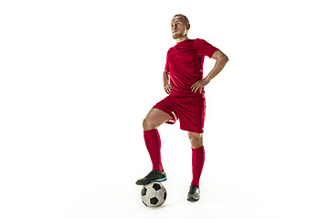 Image showing Professional football soccer player with ball isolated white background