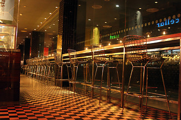 Image showing Chairs in row in bar