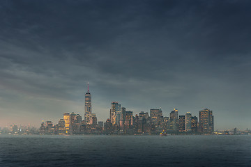 Image showing Panoramic view of storm over Lower Manhattan from Ellis Island at dusk, New York City.