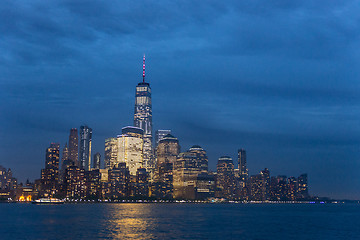 Image showing Panoramic view of Lower Manhattan from Ellis Island at dusk, New York City.