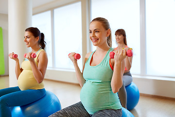 Image showing pregnant women training with exercise balls in gym