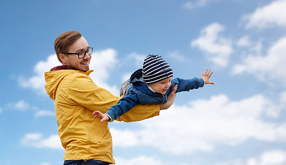 Image showing father with son playing and having fun outdoors