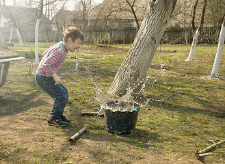 Image showing  Boy playing in the garden