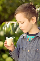 Image showing Boy eating ice cream