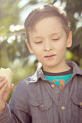 Image showing Boy eating ice cream