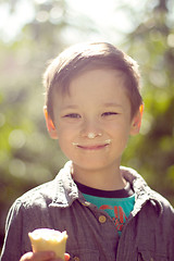 Image showing Boy eating ice cream