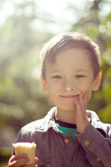 Image showing Boy eating ice cream