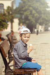 Image showing Boy eating ice cream