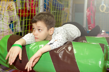 Image showing Playing room in mall with tired boy