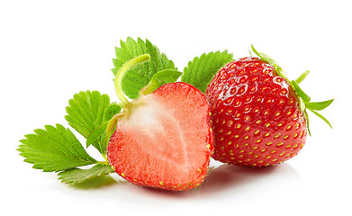 Image showing fresh red strawberries with green leaves