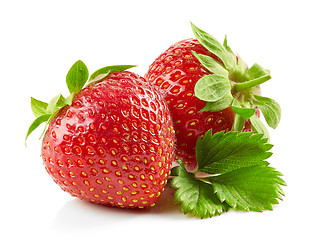 Image showing fresh red strawberries with green leaves