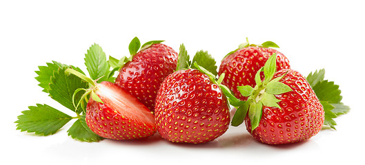 Image showing fresh red strawberries with green leaves