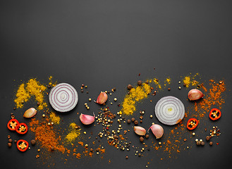 Image showing various spices on black background