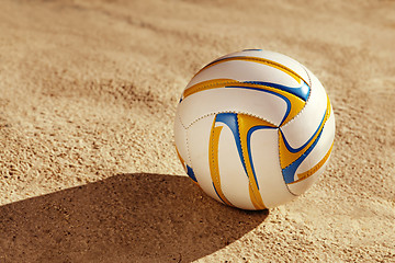 Image showing white ball on sand