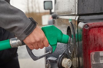 Image showing Fuel Nozzle Filling Car