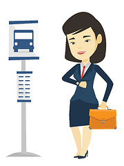 Image showing Woman waiting at the bus stop vector illustration.