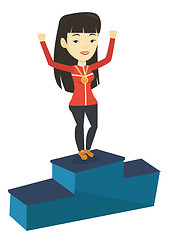 Image showing Sportswoman celebrating on the winners podium.