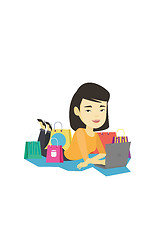 Image showing Woman shopping online vector illustration.