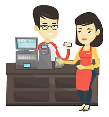 Image showing Customer paying wireless with smartphone.