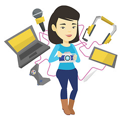 Image showing Young woman surrounded with her gadgets.