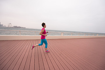 Image showing woman running on the promenade