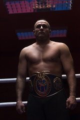 Image showing kick boxer with his championship belt