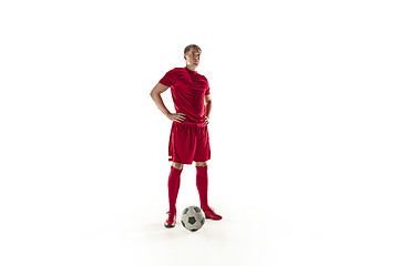 Image showing Professional football soccer player with ball isolated white background