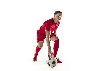 Image showing Professional football soccer player with ball isolated white background