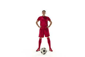 Image showing Professional football soccer player with ball isolated white background