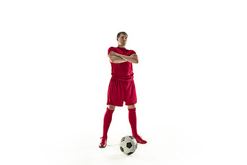 Image showing Professional football soccer player with ball isolated white background