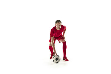 Image showing Professional football soccer player with ball isolated white background