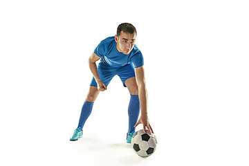 Image showing Professional football soccer player with ball isolated white background